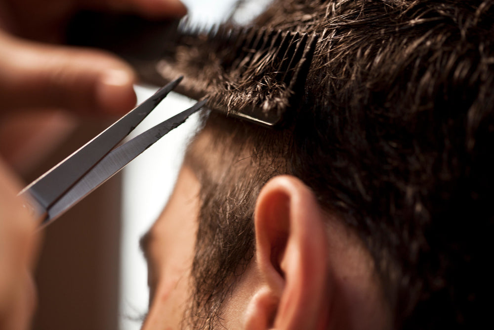 Men getting hair cut
